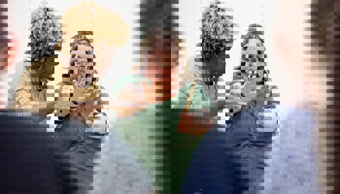 An artist takes part in a community event